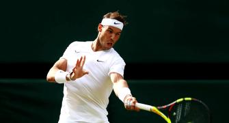 Wimbledon PIX: Federer, Rafa advance; Kerber out