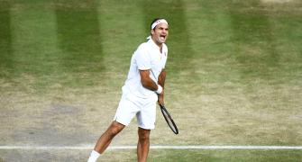 Federer downs Nadal to enter his 12th Wimbledon final