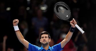 ATP Finals PIX: Federer stunned; Djokovic wins opener