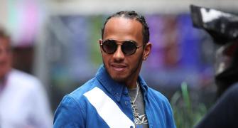 F1 champ Hamilton plays down knighthood chances