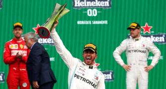 Hamilton wins in Mexico but must wait for sixth title