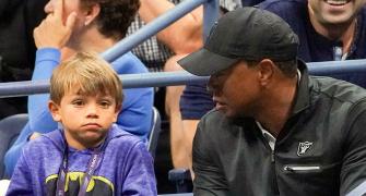 Tiger Woods battling son Charlie for green jacket