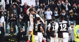 Ronaldo scores twice as Juve stay top