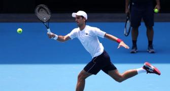Djokovic crosses fingers for clean air in Melbourne