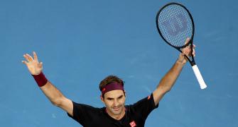PIX: Federer survives huge scare; Djokovic cruises