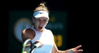 Frustrated Halep happy to advance in Melbourne