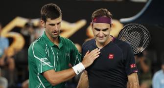 PHOTOS: Djokovic routs Federer to enter Aus Open final