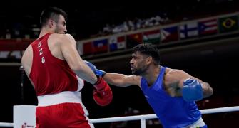 Gutsy Satish Kumar goes down to World champ Jalolov