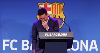 Tears, standing ovation mark Messi's Barca farewell