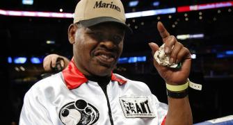 Boxer Spinks, who shocked Muhammad Ali, dies at 67