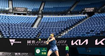 Crowd buzz missing as players grind it out at Aus Open