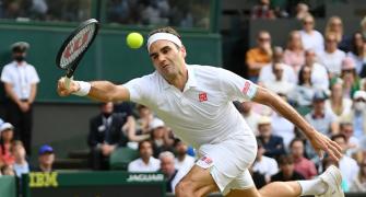 Federer roars into Wimbledon 4th round for 18th time