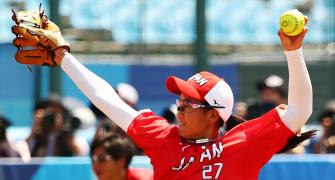 Japan win softball opener as Games 'of hope' begin