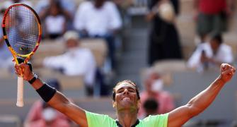 PIX: Nadal overcomes tough test to reach semis