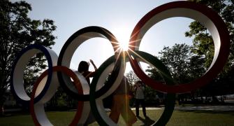 Japan's PM laments taking heat for hosting Olympics
