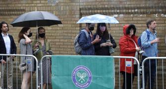 Just like old times as rain delays start of Wimbledon
