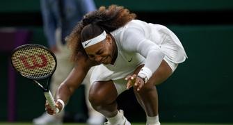 Wimbledon defends 'slippery' courts