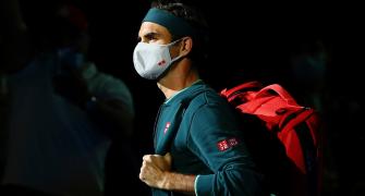 Federer returns after 14 months, no ice bath for champ