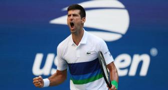 U.S. Open Pix: Djokovic cruises, Rogers stuns Barty