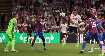 Arsenal win at Palace in Premier League opener