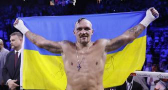 Usyk beats Joshua on split decision to retain titles