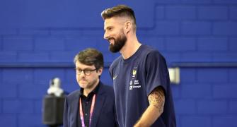 Patience is Giroud's virtue for young players