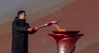 Chinese soldier, Yao Ming at Beijing torch relay