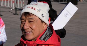 PIX: Jackie Chan carries Olympic torch atop Great Wall