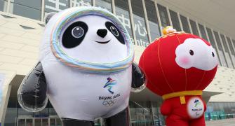 Beijing Games: Hugs discouraged but condoms available