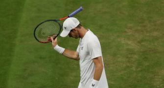 Murray's Wimbledon hopes CRUSHED by Isner