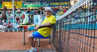 World's oldest tennis player stays put in Ukraine