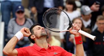 Djokovic keeps title defence on track, Zverev survives