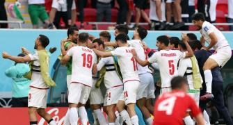 Last-gasp double keeps Iran in WC after Wales thriller