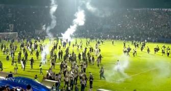 125 dead in Indonesia soccer stadium stampede