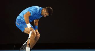 Hamstrung Djokovic taking it one day at a time