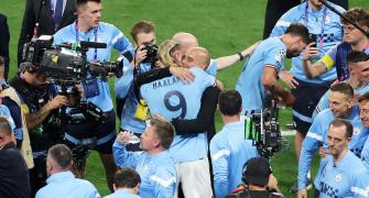 PIX! Champs Man City complete treble!