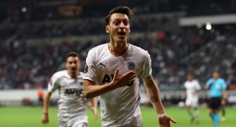 Mesut Ozil hangs up his boots