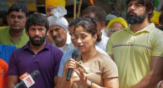 Wrestlers move towards new Parliament building, held