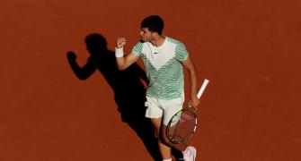 World No. 1 Alcaraz survives early test