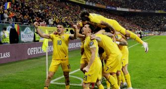 Euro qualifiers: Romania clinch top spot; France held