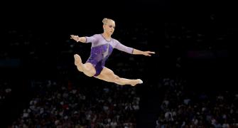 Biles slips, Italy's D'Amato takes balance beam gold