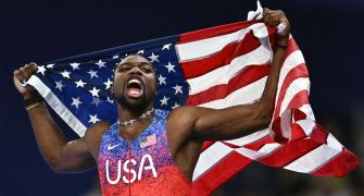 Therapy call powers Noah Lyles to Olympic 100m gold