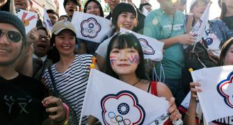 PIX: Taiwan celebrates badminton victory against China