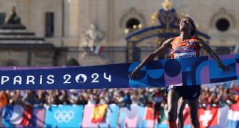 'How is this possible?' Hassan completes marathon gold