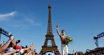 France shine at home Olympics, exceed medal target