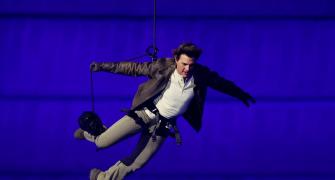 PIX: Tom Cruise in daring dive for LA Games handover