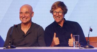 What's Agassi Doing With Jonty Rhodes?