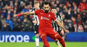 EPL PIX: Salah's brace powers Liverpool to victory