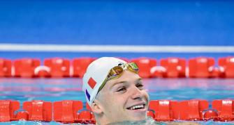 Marchand wins 400m Medley with Olympic record