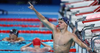 PICS: Marchand, Martinenghi make big splash in pool